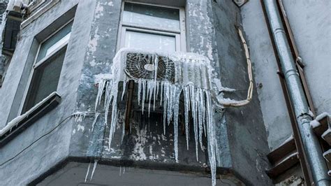 What Does It Mean When Your Air Conditioner Freezes Up, and Why Does It Feel Like Winter in July?